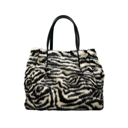 SAC FOURURE GARNI CUIR